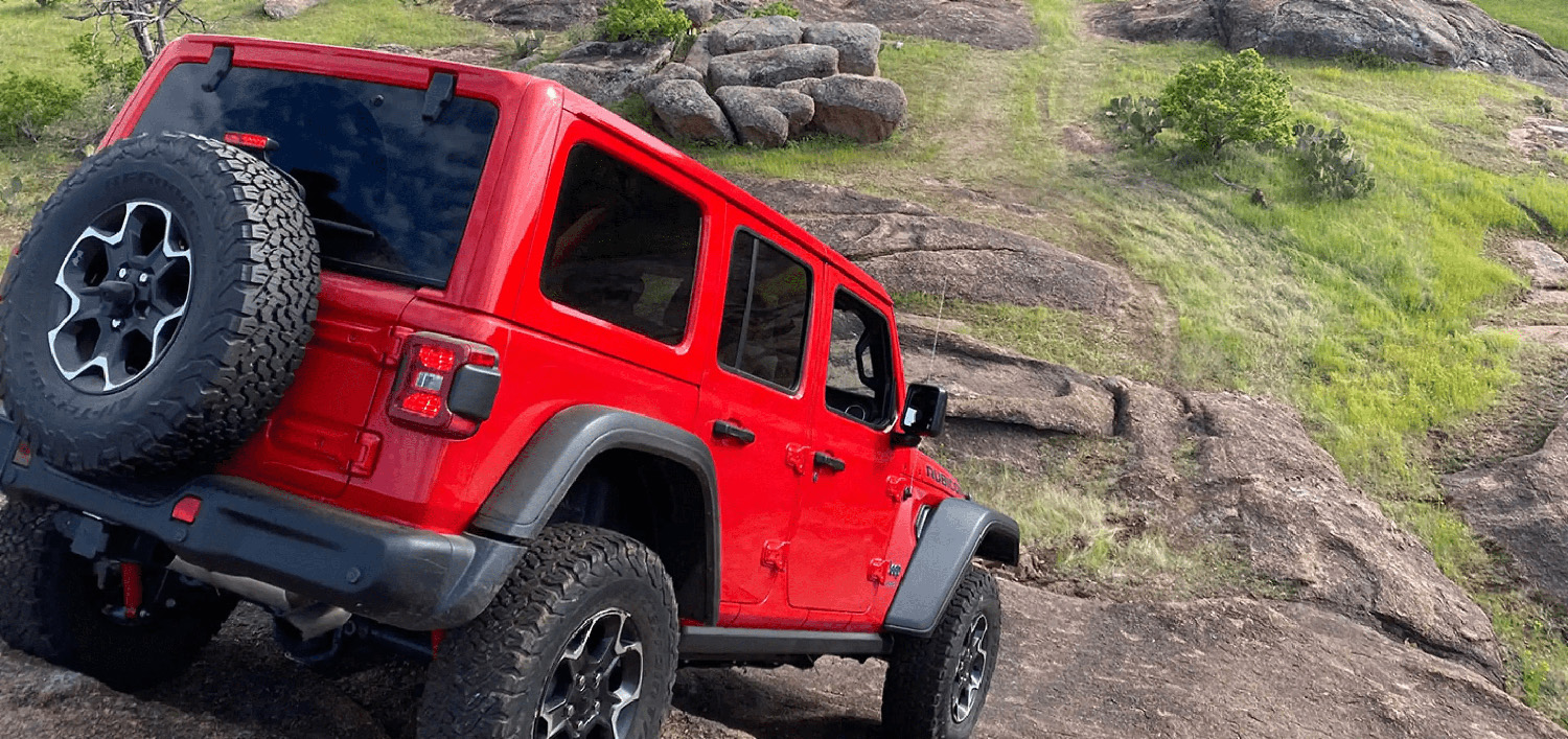 The 2023 Jeep Wrangler handling rough off-road terrain